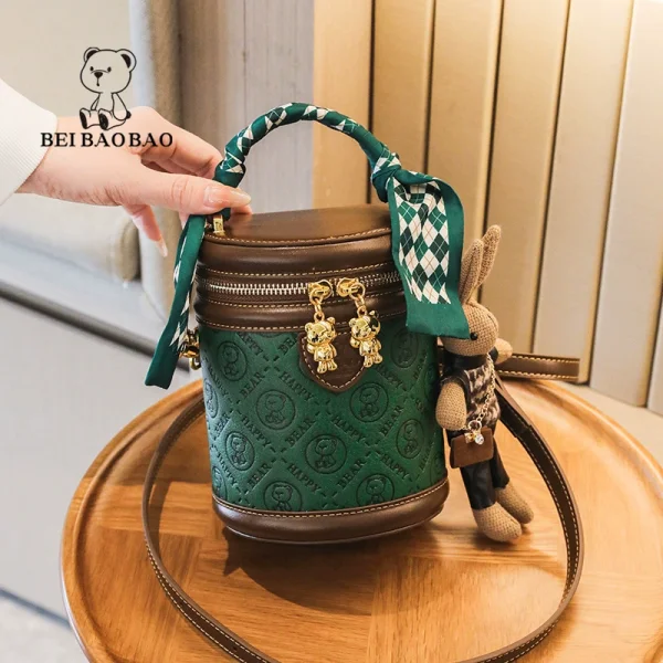 Small Green Embossed Bucket Bag with Bear Zipper Charms, Scarf Handle and Crossbody Strap
